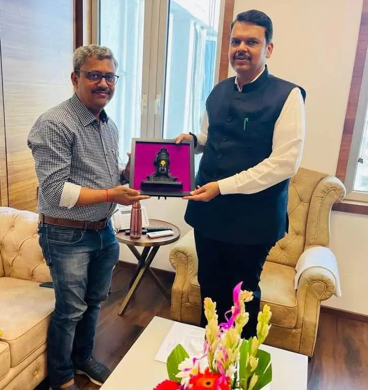 A framed portrait presented at a meeting with the Chief Minister